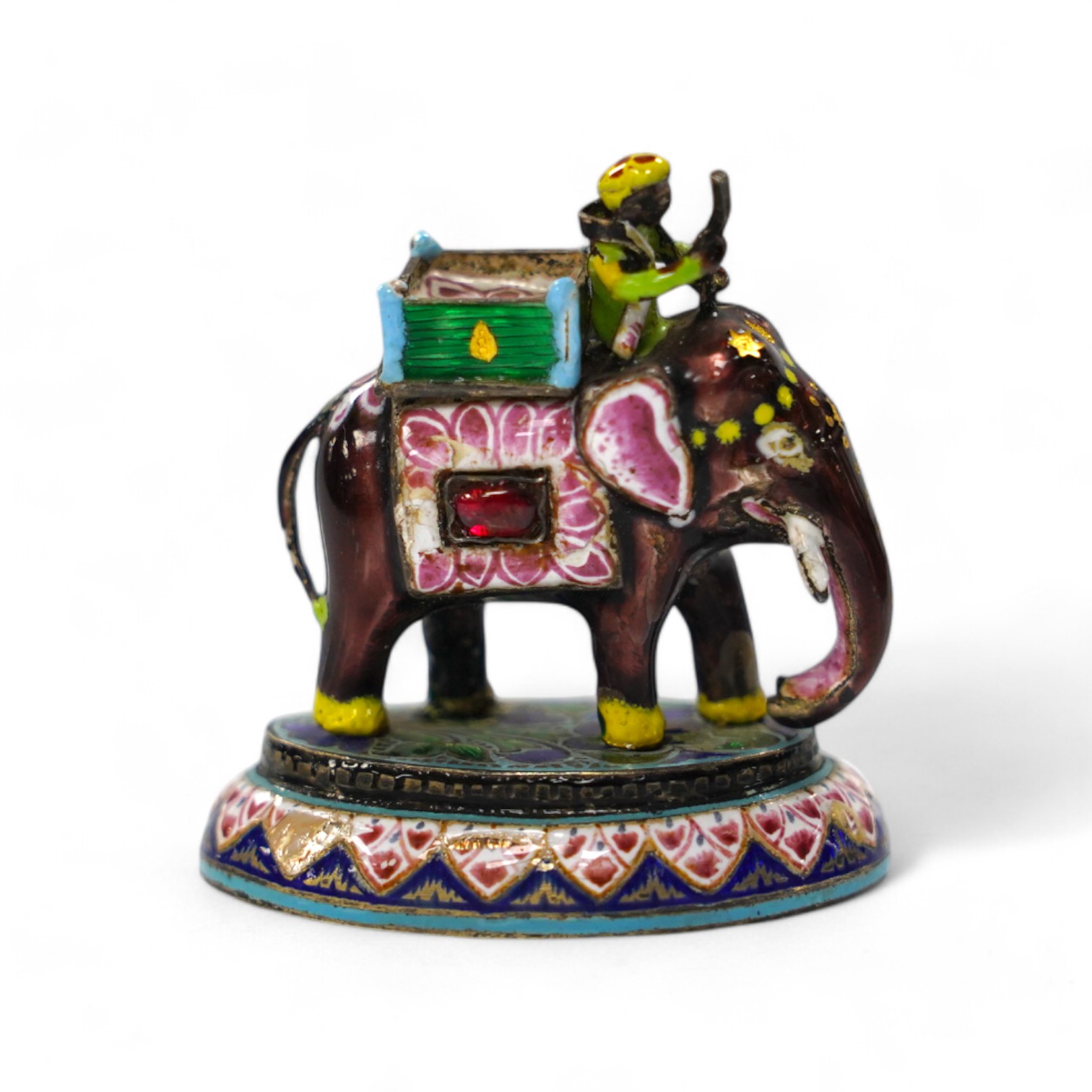 An Indian enamelled white metal elephant and mahout, 5cm. Condition - good